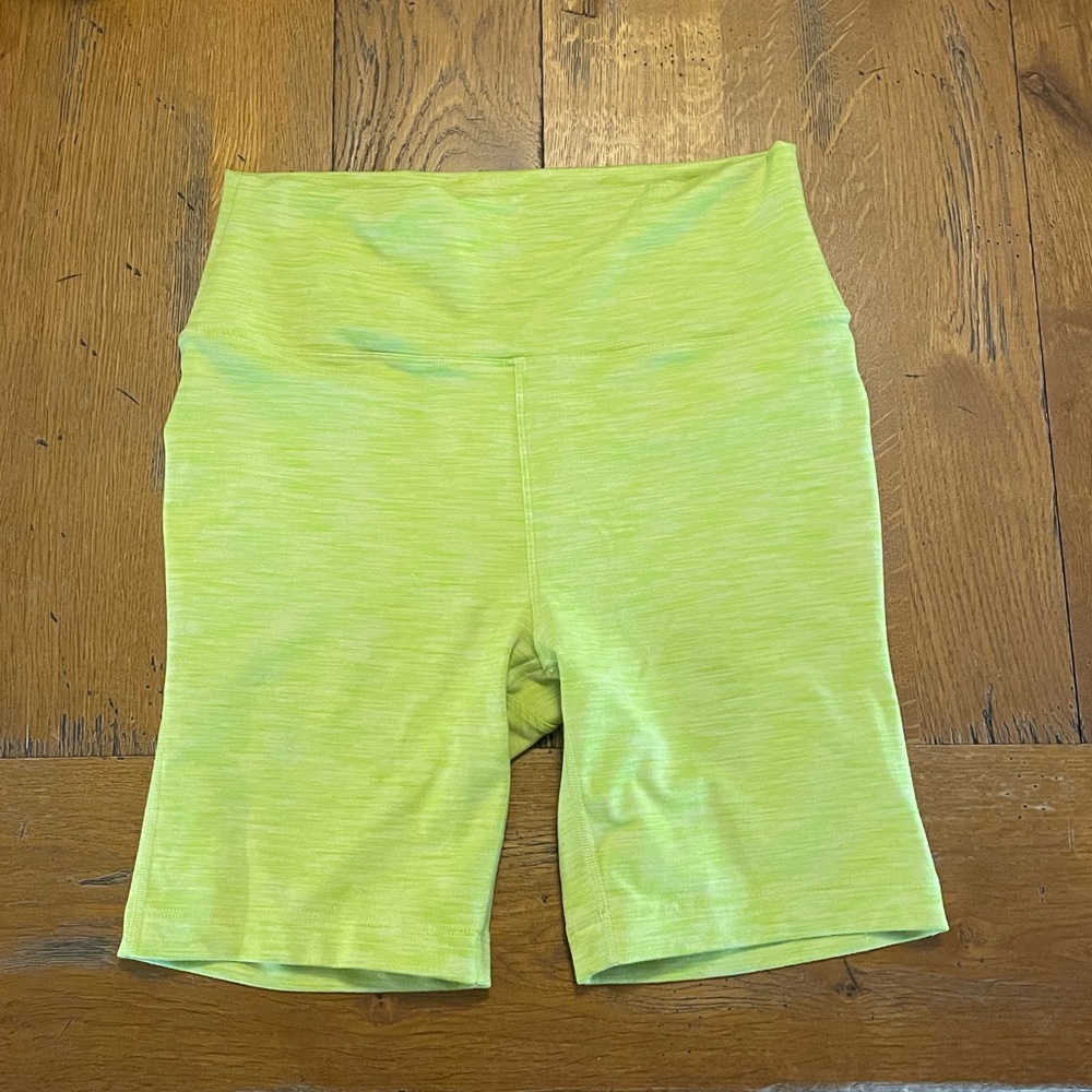 Lime green exercise shorts.